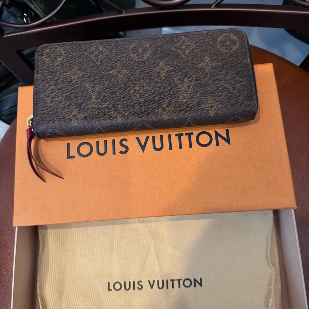 Louis Vuitton Clémence Monogram Women's Wallet in Fuchsia.